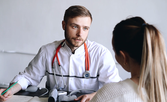 Doctor consulting patient
